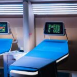 A modern hospital room featuring advanced medical equipment with digital displays. - Photo by Keysi Estrada on Pexels