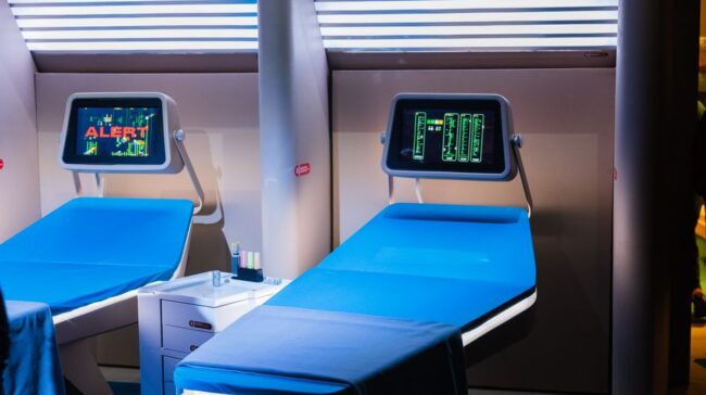 A modern hospital room featuring advanced medical equipment with digital displays. - Photo by Keysi Estrada on Pexels